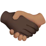 Handshake: Dark Skin Tone, Medium Skin Tone — Apple
