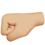 Left-Facing Fist: Medium-Light Skin Tone — Apple