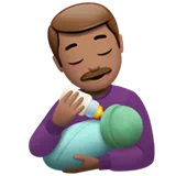 Man Feeding Baby: Medium Skin Tone — Apple