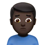 Man Frowning: Dark Skin Tone — Apple