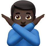 Man Gesturing No: Dark Skin Tone — Apple
