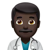Man Health Worker: Dark Skin Tone — Apple