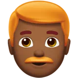 Man: Medium-Dark Skin Tone, Red Hair — Apple