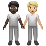 People Holding Hands: Dark Skin Tone, Medium-Light Skin Tone — Apple
