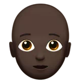 Person: Dark Skin Tone, Bald — Apple