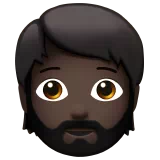 Person: Dark Skin Tone, Beard — Apple