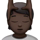 Person Getting Massage: Dark Skin Tone — Apple
