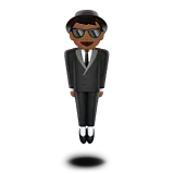 Person in Suit Levitating: Medium-Dark Skin Tone — Apple