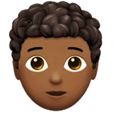 Person: Medium-Dark Skin Tone, Curly Hair — Apple
