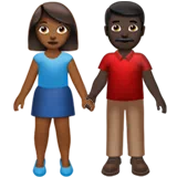 Woman and Man Holding Hands: Medium-Dark Skin Tone, Dark Skin Tone — Apple