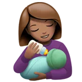 Woman Feeding Baby: Medium Skin Tone — Apple
