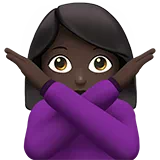 Woman Gesturing No: Dark Skin Tone — Apple