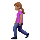 Woman Walking: Medium Skin Tone — Apple