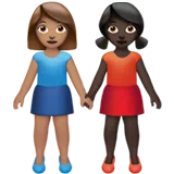Women Holding Hands: Medium Skin Tone, Dark Skin Tone — Apple