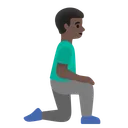 Man Kneeling Facing Right: Dark Skin Tone
