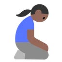 무릎 꿇은 여성: 중간 정도의 어두운 피부 톤